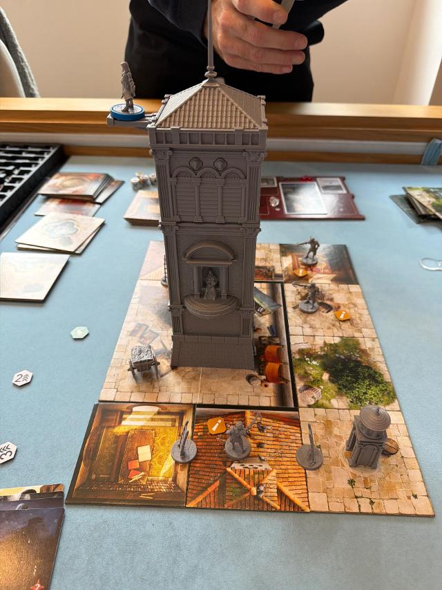 Assassin's Creed: Brotherhood of Venice auf dem Tisch, Foto von neogeneration