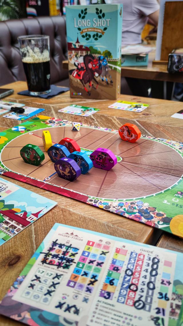 Long Shot: The Dice Game on the table, photo by thisisaspace