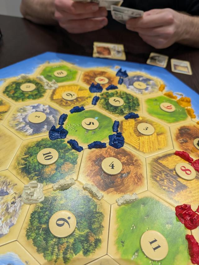 Catan: 25th Anniversary Edition sobre la taula, foto de Alba