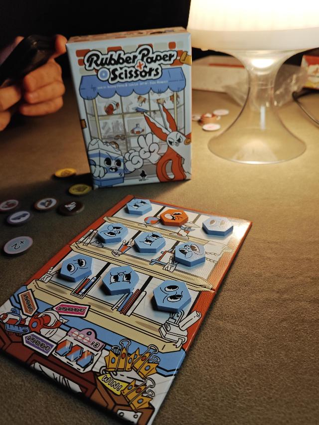 Rubber Paper Scissors on the table, photo by Julio CC