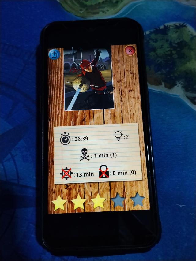 Unlock!: Short Adventures – Red Mask on the table, photo by Amy