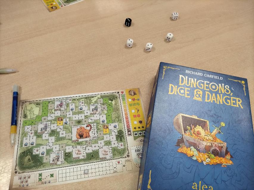 Dungeons, Dice & Danger on the table, photo by Amy