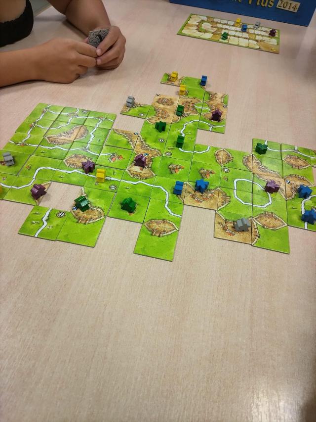 Carcassonne Big Box 5 on the table, photo by Amy
