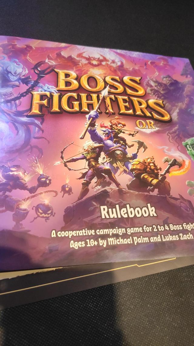 Boss Fighters QR on the table, photo by Mario Estruch