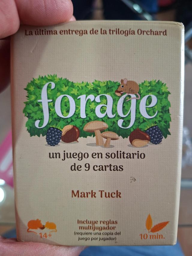 Forage: A 9 card solitaire game on the table, photo by Artur Rodríguez Coma