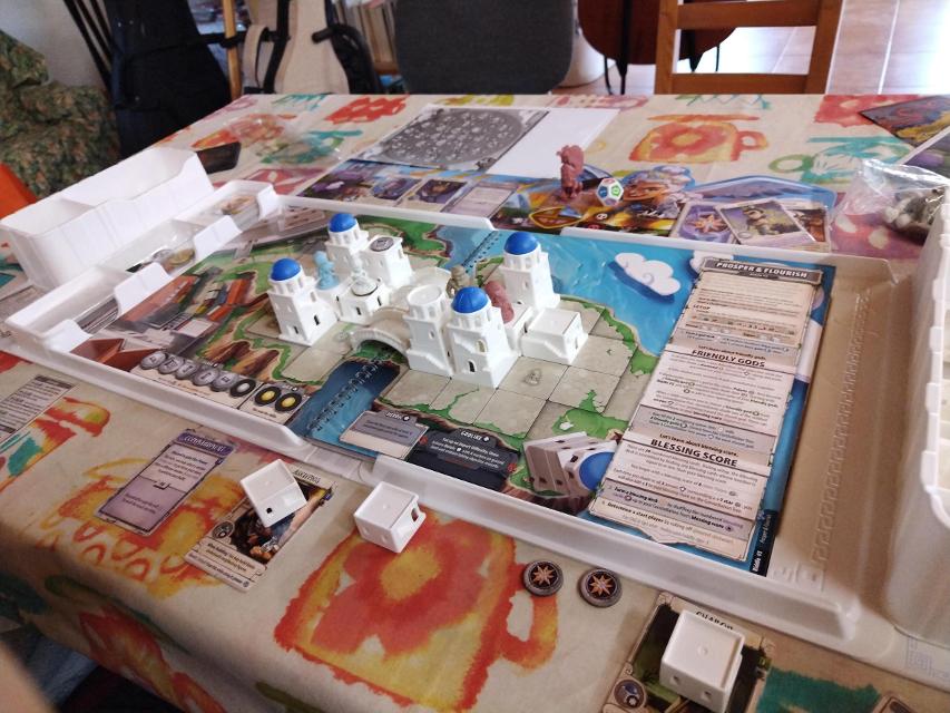 Santorini: Pantheon Edition on the table, photo by Jordi