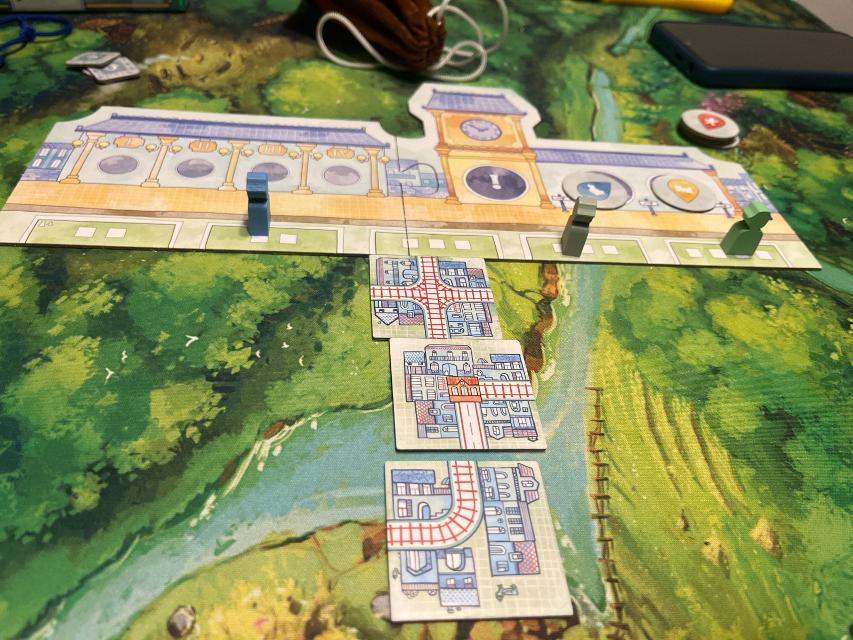 Railroad Tiles on the table, photo by Sergio Zer
