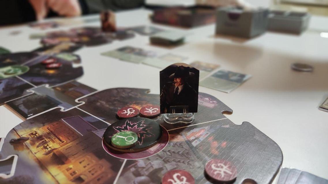 Arkham Horror (Third Edition) on the table, photo by Oriol Roy