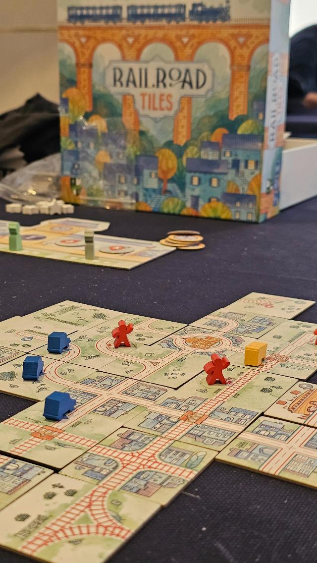 Railroad Tiles on the table, photo by Jugar y Leer