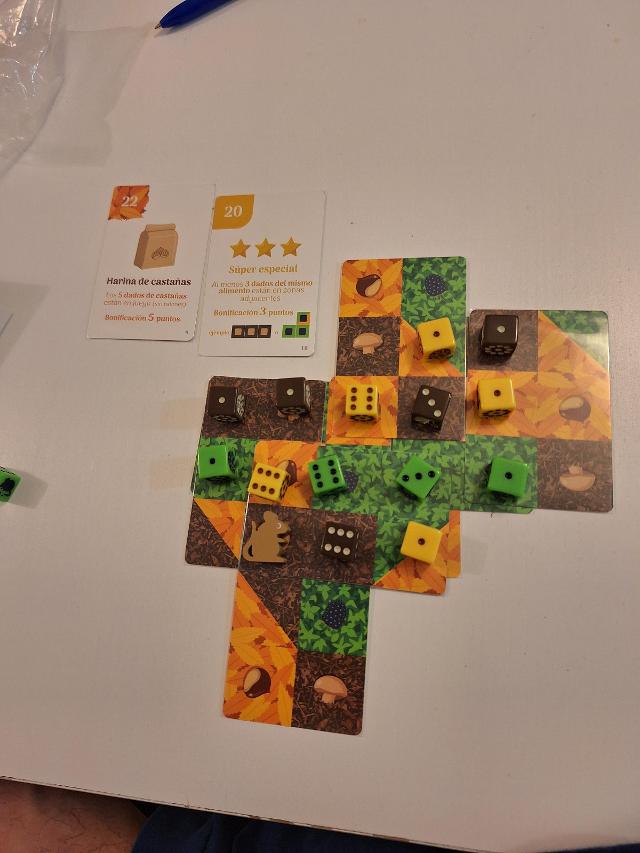 Forage: A 9 card solitaire game on the table, photo by Artur Rodríguez Coma