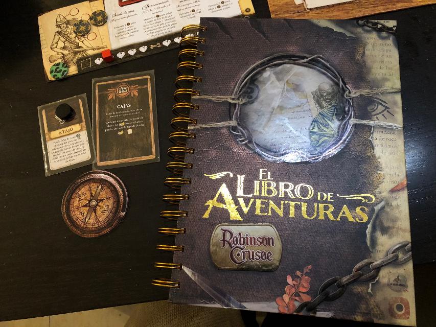 Robinson Crusoe: Adventures on the Cursed Island – Collector's Edition (Gamefound Edition) on the table, photo by Laura V.