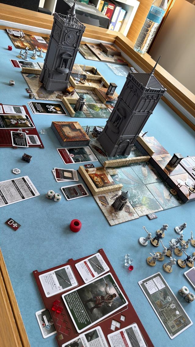 Assassin's Creed: Brotherhood of Venice auf dem Tisch, Foto von neogeneration